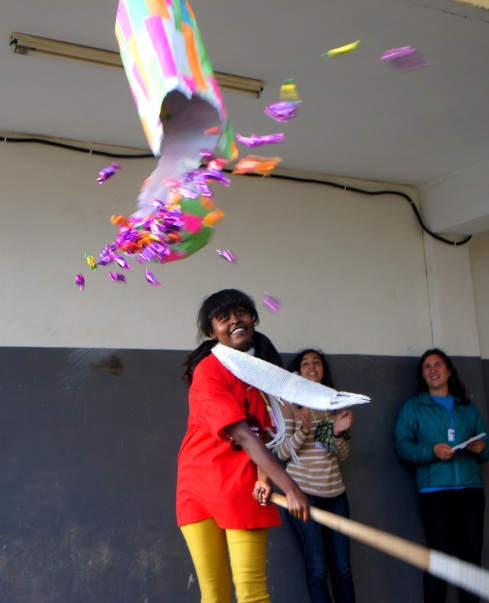 breaking the pinata with her "strong woman" statement